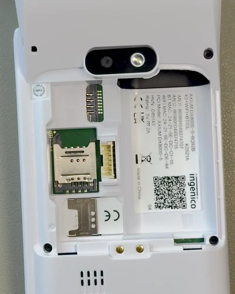 Placing the DX8000 battery and pressing the battery connector down firmly